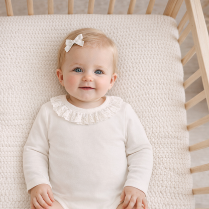 Coconut Ruffle Onesie