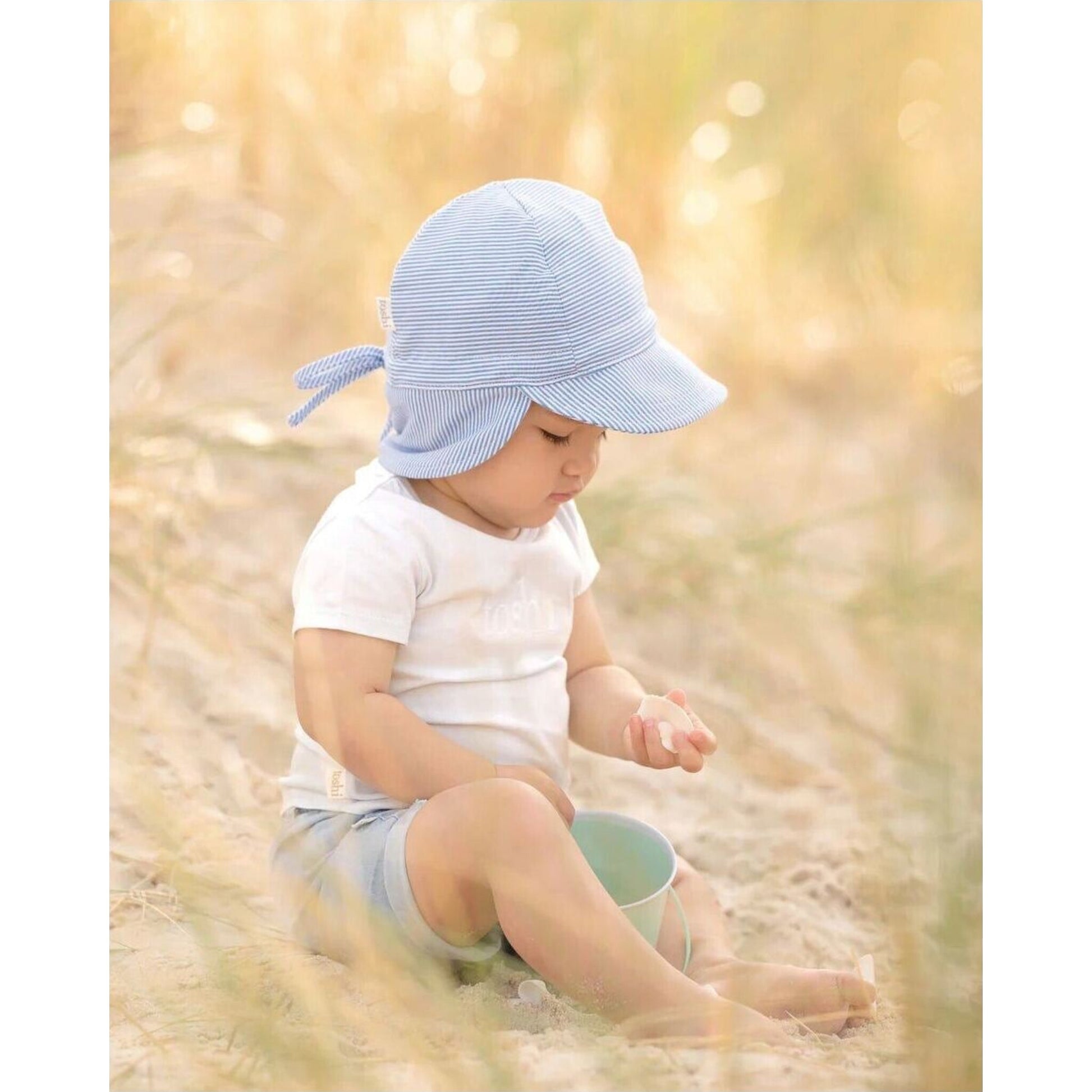 Toshi Flap Cap Baby Sky | Aster & Ruby